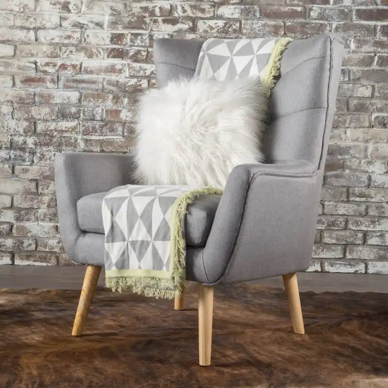 Fauteuil d'appoint haut de gamme gris à dossier à oreilles avec capitonnage
