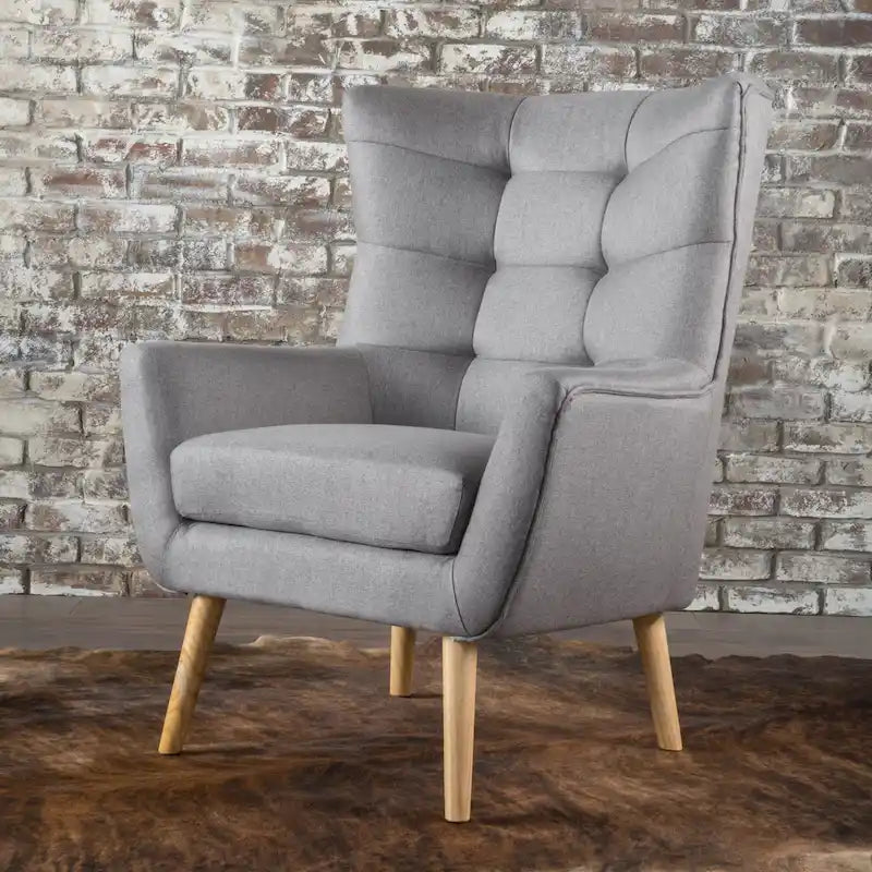 Fauteuil d'appoint haut de gamme gris à dossier à oreilles avec capitonnage
