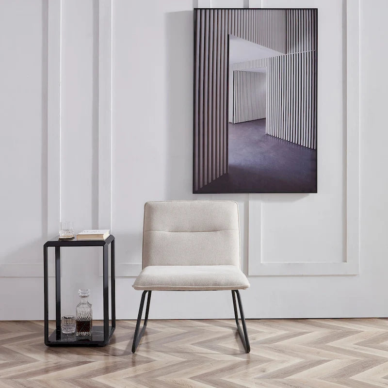 Chaise d'appoint sans accoudoirs en tissu rembourré avec pieds en métal noir
