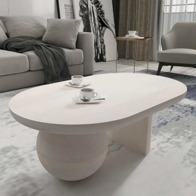 Table basse oblongue en bois de manguier massif avec pieds boules sculpturaux