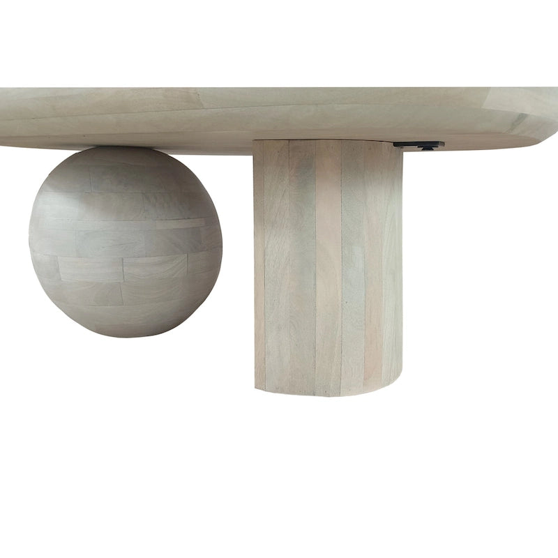 Table basse oblongue en bois de manguier massif avec pieds boules sculpturaux
