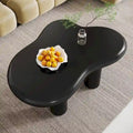 Table basse en forme de nuage avec plateau en bois composite et pieds en PVC